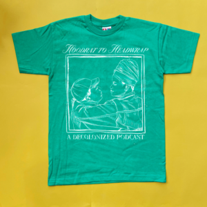 green tshirt with an outline of a person wearing a headwrap looking at another person wearing a hat with the writing Hoodrat to Headwrap at the top and at the bottom 'a decolonized podcast'